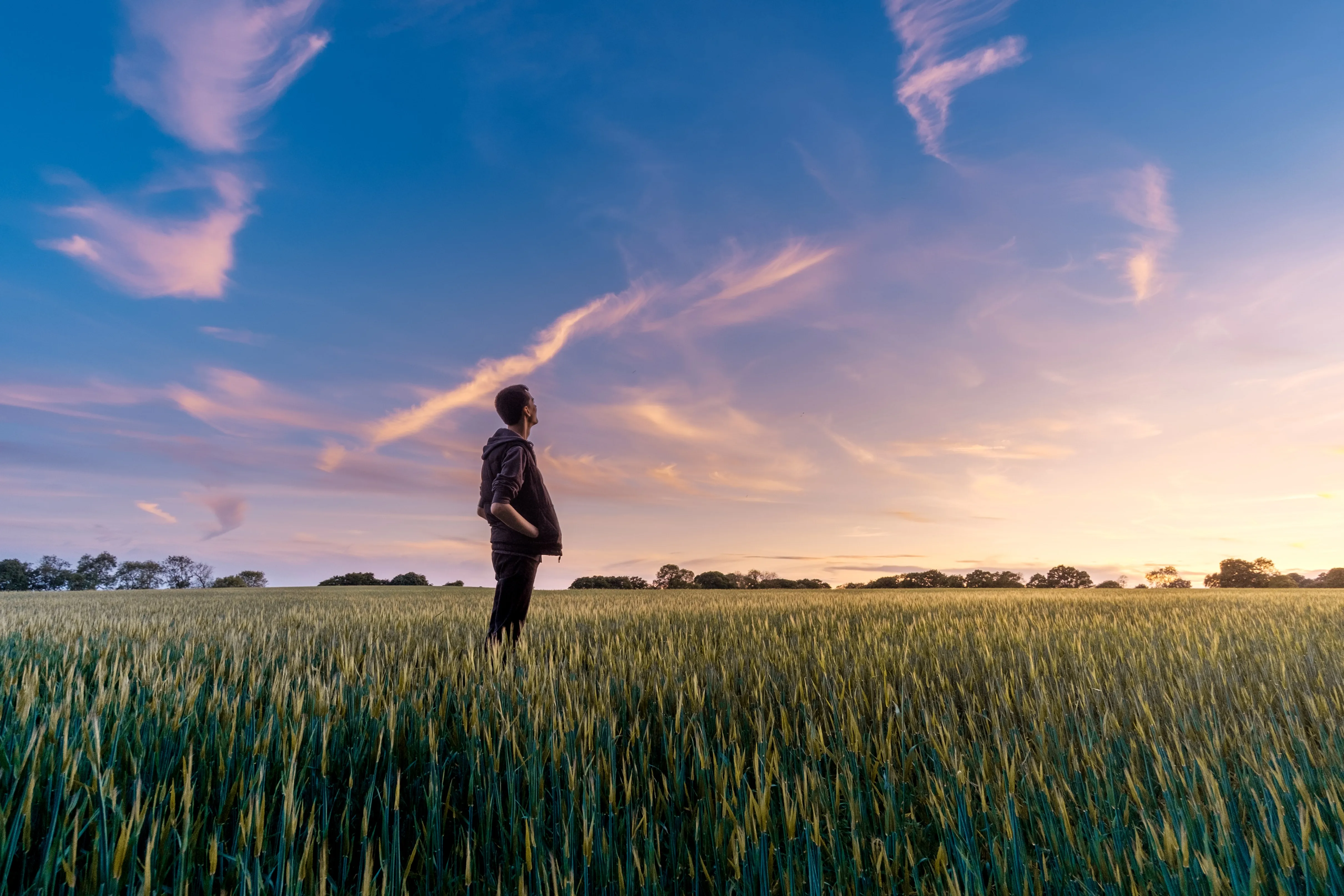 Man standing in a field.